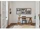 Bright office with rustic wood desk, dark trim, and chair, along with modern light colored walls at 4148 Alexander View Dr, Charlotte, NC 28226