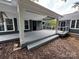 Expansive covered deck, perfect for entertaining and enjoying the outdoors at 4221 Hounds Run Dr, Matthews, NC 28105