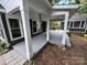 Spacious covered porch with ample room for outdoor seating and relaxation at 4221 Hounds Run Dr, Matthews, NC 28105