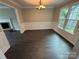 Charming dining room with beautiful wood-paneled walls and large windows, perfect for gatherings at 4221 Hounds Run Dr, Matthews, NC 28105