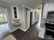 Modern kitchen with subway tile, a barn door and stainless appliances providing an efficient design at 4221 Hounds Run Dr, Matthews, NC 28105
