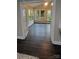 A sun room has french doors, many windows, and dark floors at 4221 Hounds Run Dr, Matthews, NC 28105