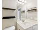 Modern bathroom featuring open shelving and chrome hardware at 448 River Park Rd, Belmont, NC 28012