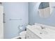 Stylish bathroom featuring a modern vanity, round mirror, and commode at 448 River Park Rd, Belmont, NC 28012