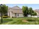 Well-manicured lawn on the side of a charming house, enhanced by mature trees and greenery at 448 River Park Rd, Belmont, NC 28012