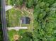 Aerial view of the home situated on a well-maintained lot with mature trees at 4592 Reid Rd, Edgemoor, SC 29712