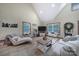 Bright living room with vaulted ceilings, wood floors and ample natural light at 4592 Reid Rd, Edgemoor, SC 29712