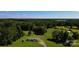 Charming home with a spacious lawn surrounded by lush trees, offering privacy and a serene country setting at 4713 White Store Rd, Wingate, NC 28174