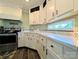 Bright kitchen featuring white cabinetry, sleek countertops, and updated appliances at 4713 White Store Rd, Wingate, NC 28174