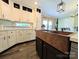Charming kitchen with a unique copper sink, ample counter space, and lots of storage at 4713 White Store Rd, Wingate, NC 28174