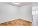 Bedroom features hardwood floors, blank canvas for personalization and relaxation at 4806 Spring Lake Dr # D, Charlotte, NC 28212