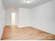 Bedroom featuring wood-look flooring, and doorways to other rooms at 4806 Spring Lake Dr # D, Charlotte, NC 28212