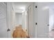 Hallway with wood-look flooring that connects to other rooms at 4806 Spring Lake Dr # D, Charlotte, NC 28212