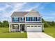 Charming two-story home with a manicured lawn, two-car garage and lovely curb appeal at 490 Lenswood Ct, Denver, NC 28037