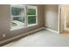 Bright bedroom with neutral carpet, paint and view of the neighborhood at 5003 Tremont Dr, Indian Trail, NC 28079