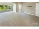 Bedroom boasting large windows, neutral carpet and natural light at 5003 Tremont Dr, Indian Trail, NC 28079