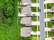 Aerial view of homes showcasing well-maintained lawns and landscaping with mature trees and neighborhood streets at 5069 Thomasville Dr, Belmont, NC 28012