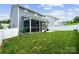 Large backyard with a patio, screened-in porch, and lush green lawn, great for outdoor enjoyment at 5069 Thomasville Dr, Belmont, NC 28012