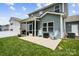 Outdoor patio with chairs, perfect for enjoying the backyard at 5069 Thomasville Dr, Belmont, NC 28012