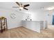 Bonus room featuring neutral walls, carpet, ceiling fan, and decorative shelving at 5069 Thomasville Dr, Belmont, NC 28012