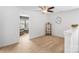 This open bonus room features neutral walls, carpet, ceiling fan, and view into sitting area at 5069 Thomasville Dr, Belmont, NC 28012