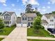 Charming two-story home featuring a three-car garage, manicured lawn, and inviting curb appeal in a lovely community at 5069 Thomasville Dr, Belmont, NC 28012
