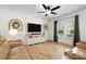 Bright living room featuring a large window, stylish decor, and modern furnishings at 5069 Thomasville Dr, Belmont, NC 28012
