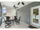 Covered patio with ceiling fans and comfortable seating for outdoor relaxation and entertaining at 5069 Thomasville Dr, Belmont, NC 28012