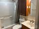Cozy bathroom with a shower-tub combination and traditional vanity at 5722 Oak Dr, Charlotte, NC 28216