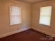 Empty bedroom featuring natural light and carpet flooring at 5722 Oak Dr, Charlotte, NC 28216