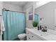 Classic bathroom featuring a vanity, a mirror, and a shower-tub combination at 615 N Oak Dr, Huntersville, NC 28078