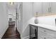 Elegant butler's pantry with custom cabinetry, a wine cooler, and countertop space at 615 N Oak Dr, Huntersville, NC 28078