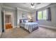 Comfortable bedroom with soft carpet, natural light, and calming decor provides a relaxing retreat at 6216 North Rd, York, SC 29745