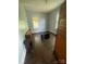 Bedroom featuring hardwood floors, natural light, and classic charm at 716 N Fulton St, Salisbury, NC 28144
