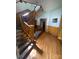 Inviting foyer showcasing the hardwood floors and an open staircase to the second story at 716 N Fulton St, Salisbury, NC 28144