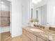 Bathroom with vanity, granite countertop, sink and decor at 7912 Baltusrol Ln, Charlotte, NC 28210