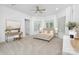 Bedroom features carpet, natural light from multiple windows, and desk at 7912 Baltusrol Ln, Charlotte, NC 28210