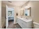 Bright bathroom with double vanity and access to bedroom at 8310 Brickle Ln, Huntersville, NC 28078