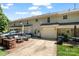Charming townhome featuring a car, garage, patio, and backyard at 8310 Brickle Ln, Huntersville, NC 28078