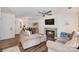 Cozy living room featuring a fireplace, TV, comfortable seating, and elegant decor at 8310 Brickle Ln, Huntersville, NC 28078