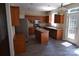 Well-equipped kitchen with stainless steel appliances, granite countertops, and an island at 9228 Old Barnette Pl, Huntersville, NC 28078