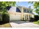 Well-maintained two-story home with a two-car garage at 9808 Steed Ct, Charlotte, NC 28269