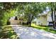 Two-story home with a spacious driveway and green lawn at 9808 Steed Ct, Charlotte, NC 28269