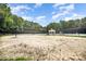 Enjoy a beach volleyball court with a gazebo and tennis court located nearby under a bright, sunny sky at 9808 Steed Ct, Charlotte, NC 28269