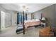 Cozy bedroom with soft carpet, a comfortable bed, and a window for natural light at 1003 Cranberry Cir, Fort Mill, SC 29715