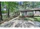Welcoming home with lovely front garden and gray siding at 1003 Cranberry Cir, Fort Mill, SC 29715