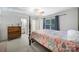 Bedroom featuring a comfortable bed, a window, and closet access at 1003 Cranberry Cir, Fort Mill, SC 29715
