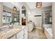 Bright bathroom features dual vanity, walk-in shower, soaking tub, and modern fixtures at 1009 Hercules Dr, Indian Trail, NC 28079