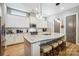 Stylish kitchen with a center island, modern lighting, stainless steel appliances, and sleek cabinetry at 1009 Hercules Dr, Indian Trail, NC 28079