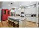Contemporary kitchen featuring a large island, stainless steel appliances, and ample counter space at 1009 Hercules Dr, Indian Trail, NC 28079